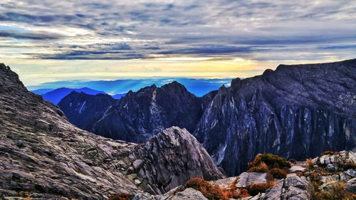 Scenic view of mountains against sky during sunset