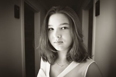 Close-up portrait of girl at home