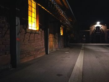 Illuminated corridor at night