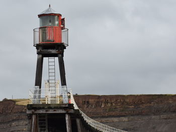 Low angle view of lighthouse against sky