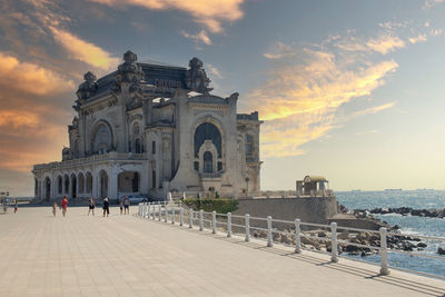 View of historic building against cloudy sky