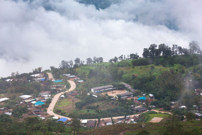 High angle view of buildings against sky