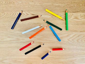 High angle view of colored pencils on table