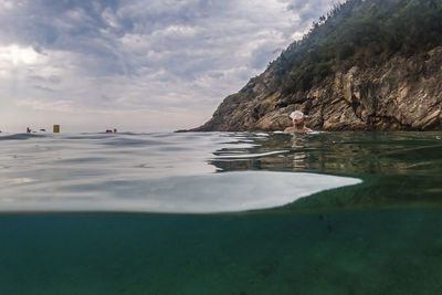 Little kid snorkeling on the sea 