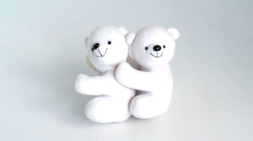 High angle view of stuffed toy against white background