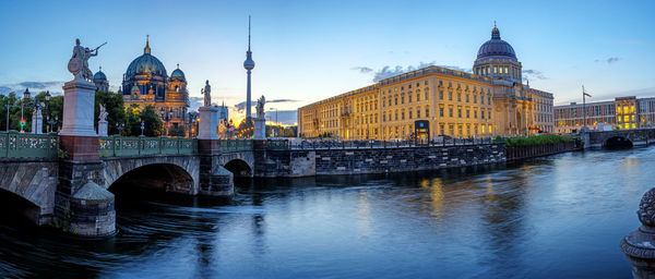 Panorama of the berlin cathedral, the tv tower and the reconstructed city palace before sunrise