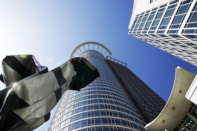 Low angle view of modern buildings against sky