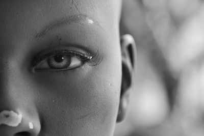 Close-up portrait of woman with eye make-up