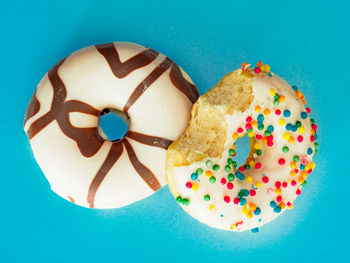 Directly above shot of cake against blue background