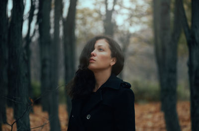 Portrait of woman in forest