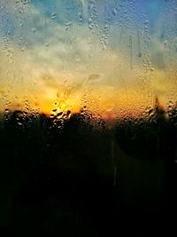 Close-up of water drops on glass window