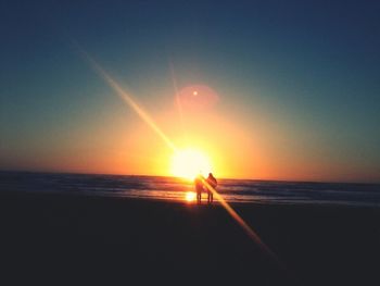 Scenic view of sunset over sea