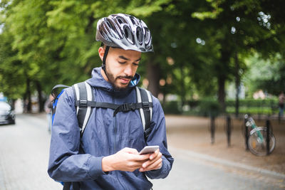 Young man using mobile phone