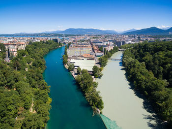 High angle view of river amidst buildings in city