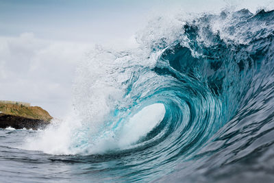 Sea wave against sky