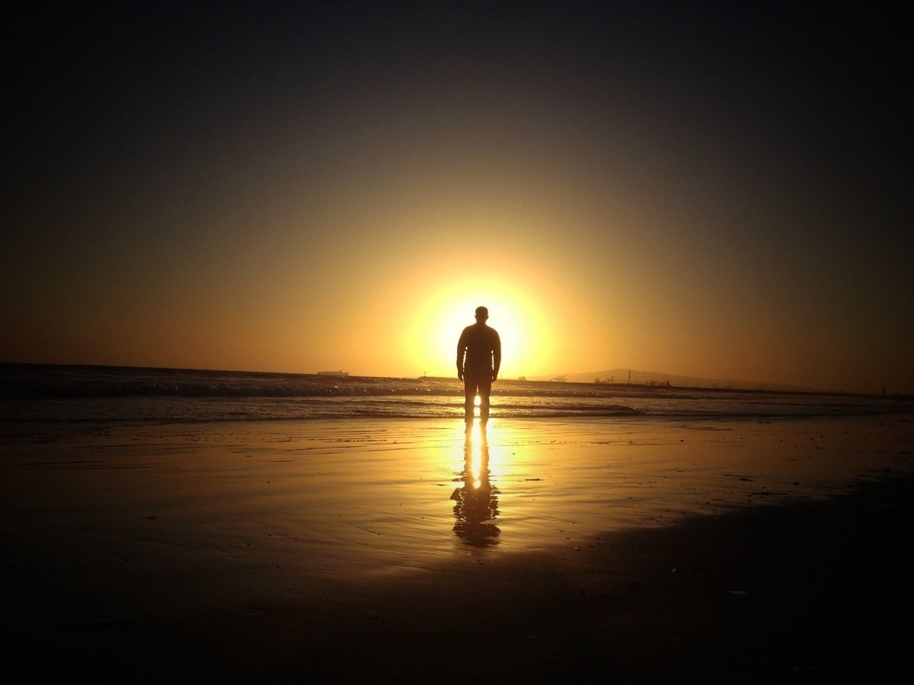 sunset, sea, water, beach, silhouette, horizon over water, shore, full length, standing, scenics, lifestyles, leisure activity, tranquil scene, clear sky, tranquility, reflection, orange color, copy space