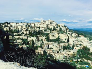 High angle view of buildings on rural hillside