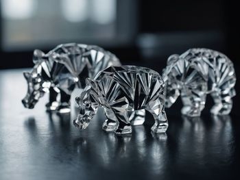 Close-up of wedding rings on table