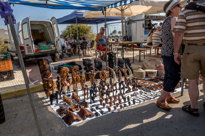 People at street market in city