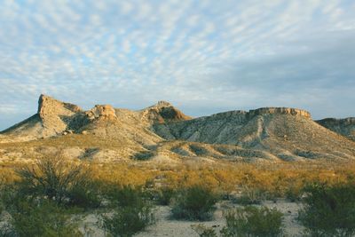 Scenic view of rocky mountains against sky