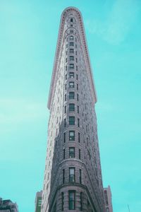 Low angle view of skyscrapers against clear sky