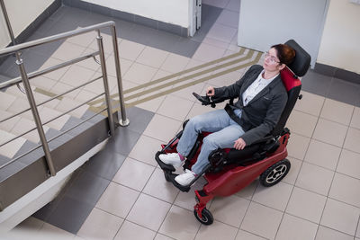 High angle view of man holding car