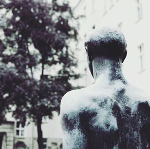 Rear view of man with snow