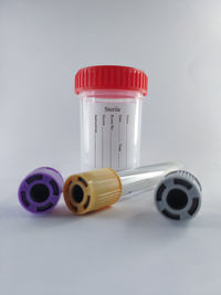 Close-up of multi colored pencils against white background