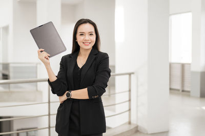 Portrait of a smiling young woman