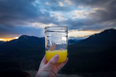 Close-up of cropped hand holding ice cream