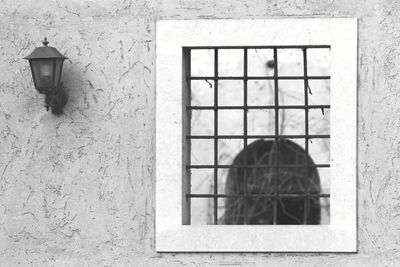 Close-up of window in front of building