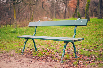 Empty bench in park