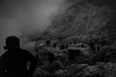 Rear view of people on mountain