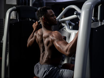 Man exercising in gym