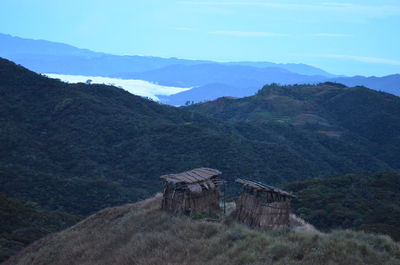 Scenic view of landscape and mountains against sky