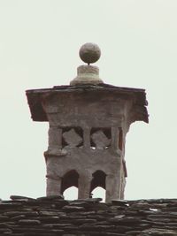 Low angle view of old temple against clear sky