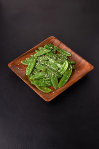 Fried snow peas in asian style