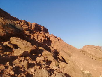 Scenic view of rocky mountains against clear sky