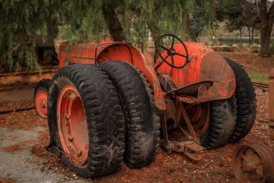 Abandoned car on field