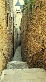 Walkway amidst buildings