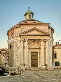 Exterior of historic building against sky