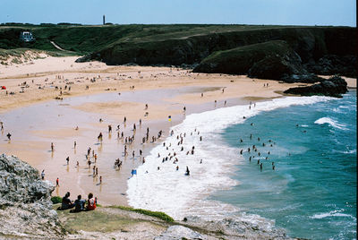 High angle view of crowd in sea shore