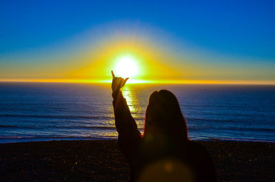 Scenic view of sea at sunset