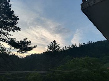 Scenic view of mountains against sky at sunset