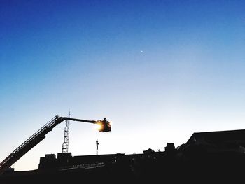 Low angle view of buildings against clear sky