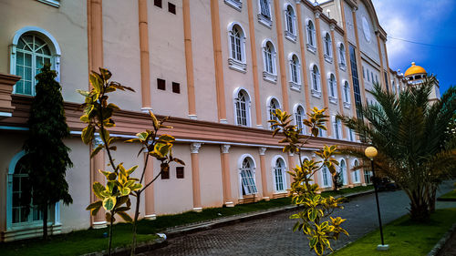 Street by buildings in city