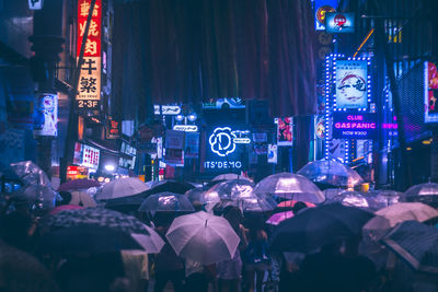 Crowd in city at night