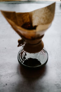 High angle view of coffee cup on table