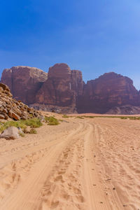 Scenic view of desert against clear sky