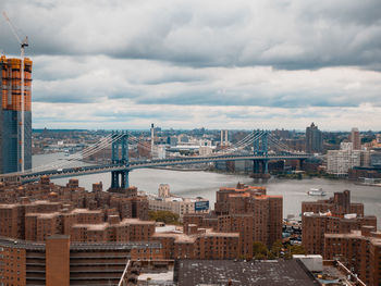 High angle view of suspension bridge in city